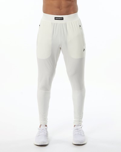 Alphalete Woven 4-Way Stretch 29" Pant Resin | ONID-59470