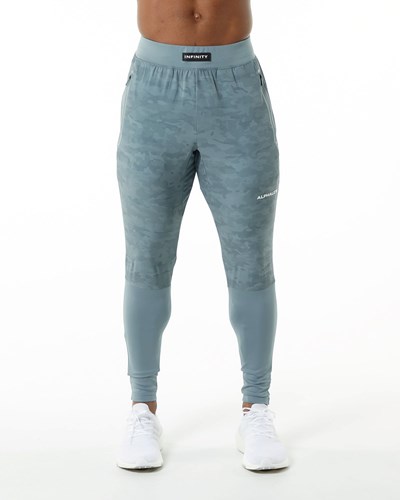 Alphalete Woven 4-Way Stretch 29" Pant Sea Level | VHKX-03248