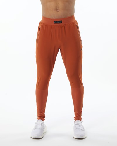 Alphalete Woven 4-Way Stretch 29" Pant Sour Tangerine | WZPF-04182